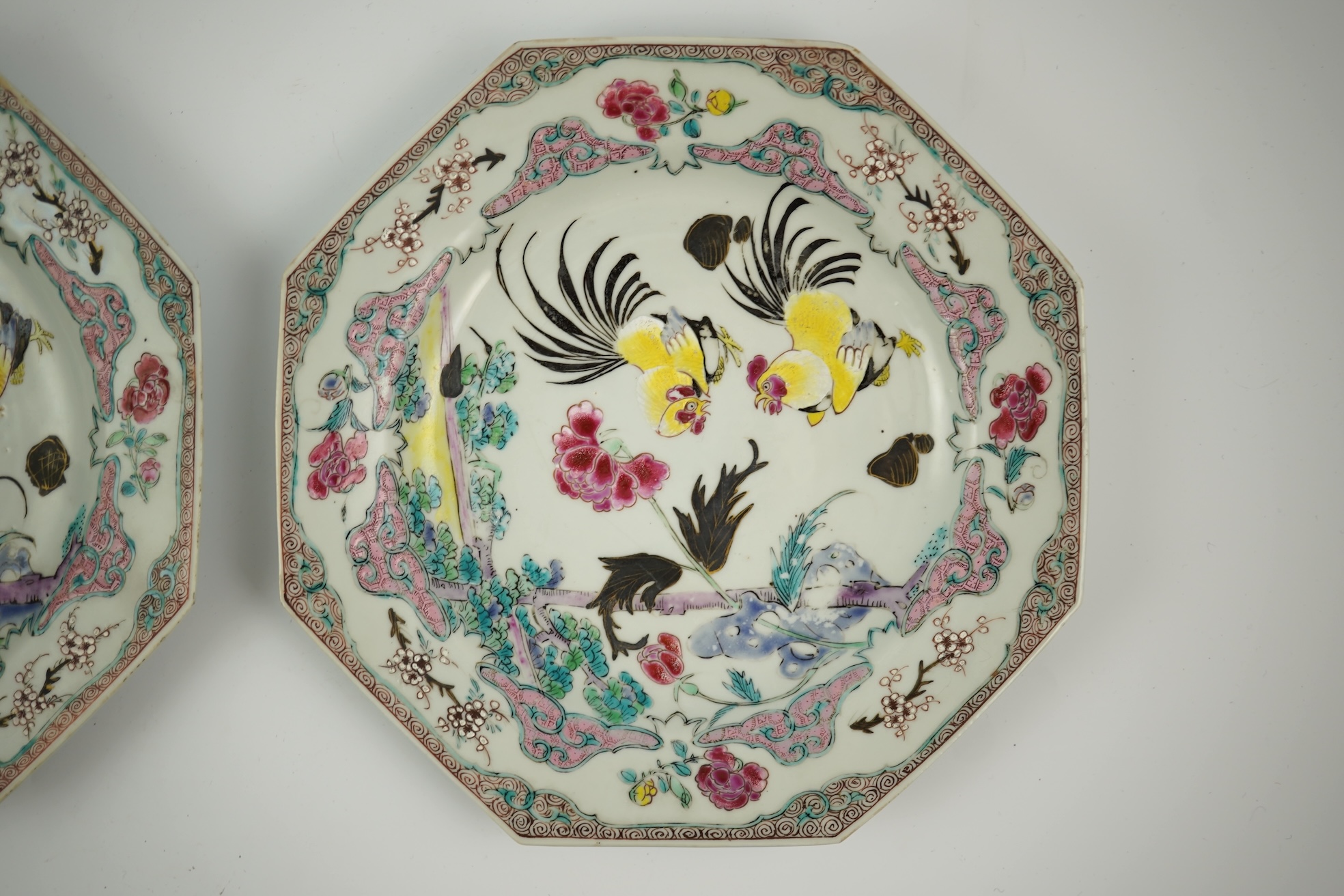 A pair of Chinese famille rose ‘cockerel’ octagonal plates, Yongzheng period